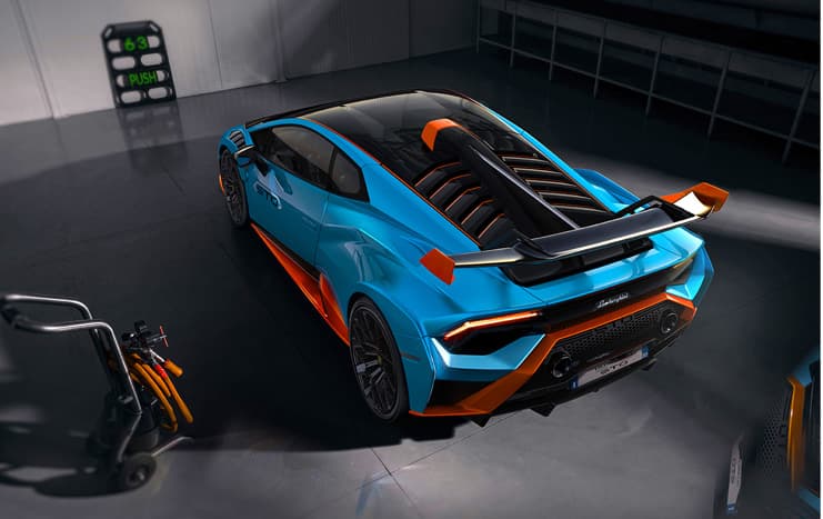 Lamborghini Huracán STO exterior image showing rear driver side angle from above.