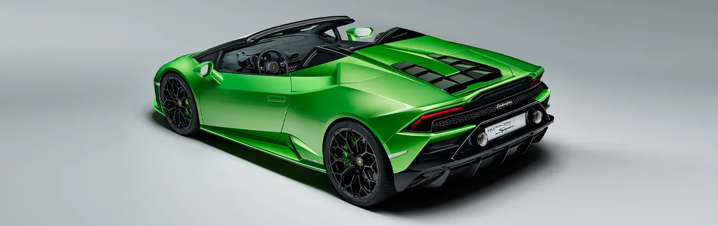 Lamborghini Huracán EVO Spyder exterior image driver side rear angle view from slightly above.